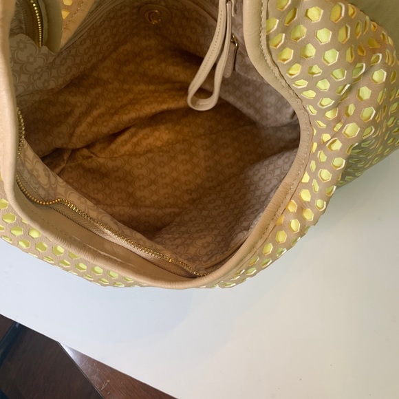 Charming Charlie Tan and Yellow Buttercup perforated Hobo Handbag - Picture 7 of 10